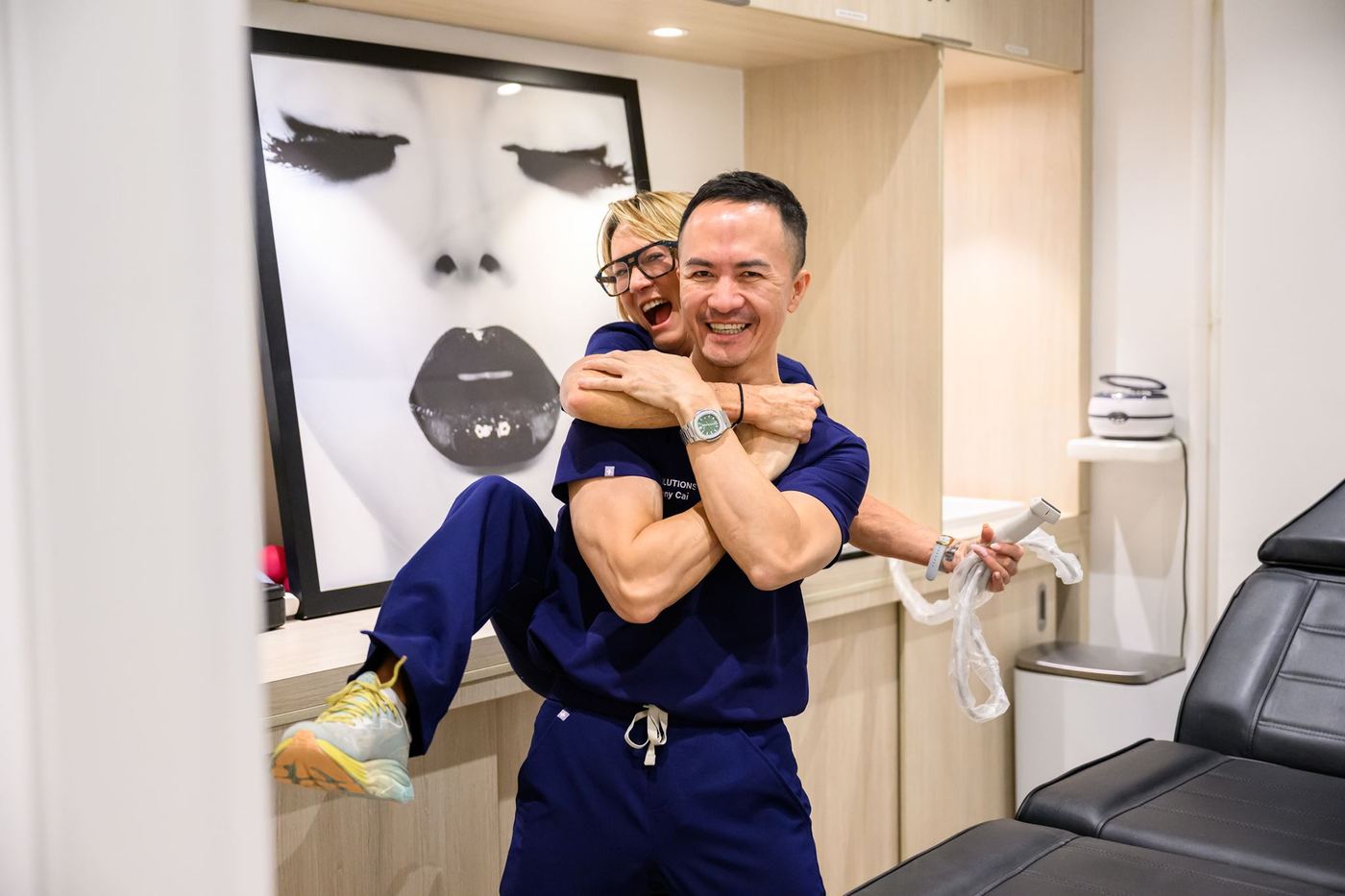 Dr. Danny Cai with a colleague at the clinic